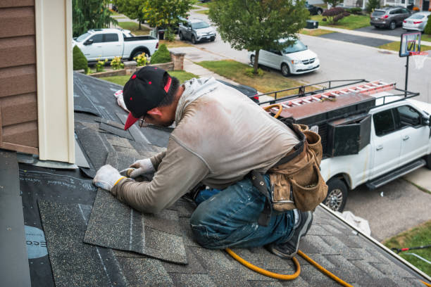 Professional Roof Replacement technician working in Rutherford, NJ